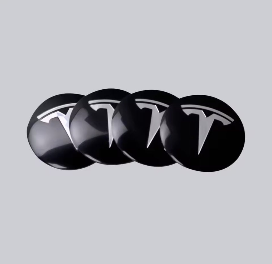 Adhesive wheel-centre badges with Tesla logo